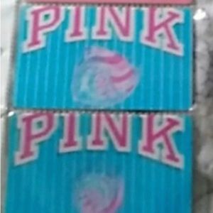 Pink cardboard display replica of gift card